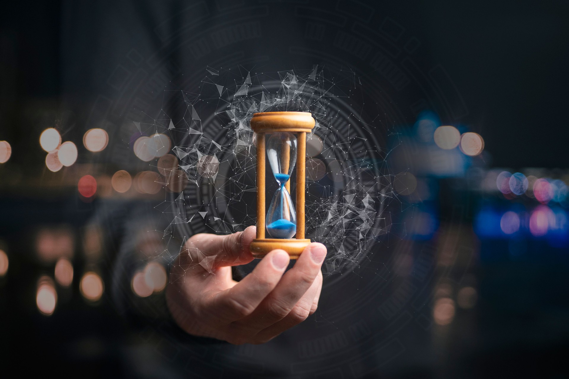 time management concept, businessman holding hourglass